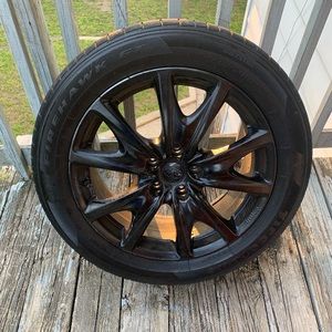 Four tires with rims